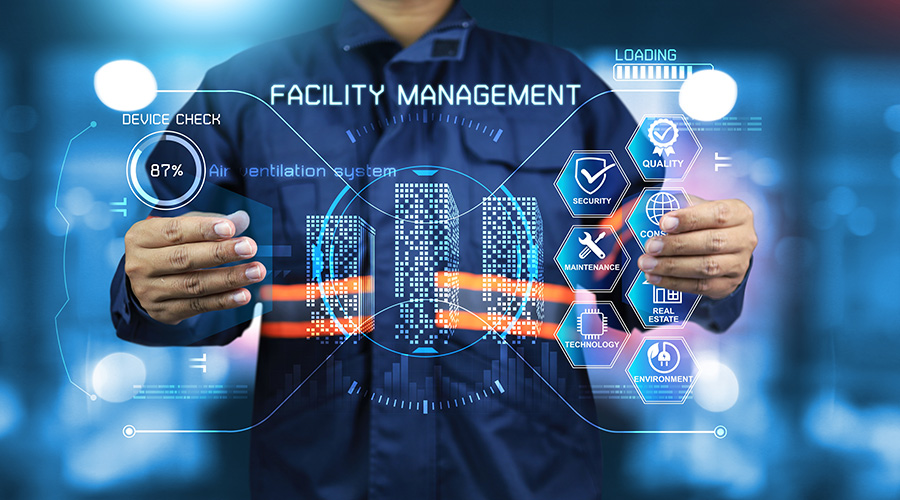 Facility management concept with holographic interface showing building systems, maintenance, security, quality, technology, real estate, and environment solutions